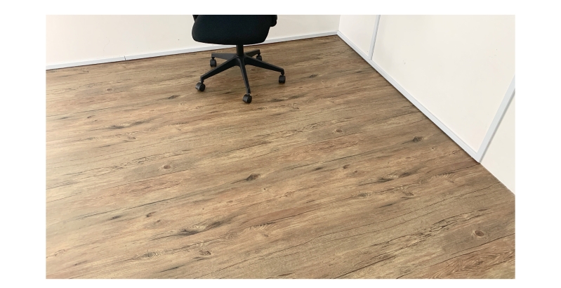 a side of the perfect room perfectly installed with a wood flooring